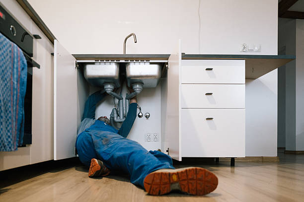 Professional Emergency Plumber technician working in Webster, NY